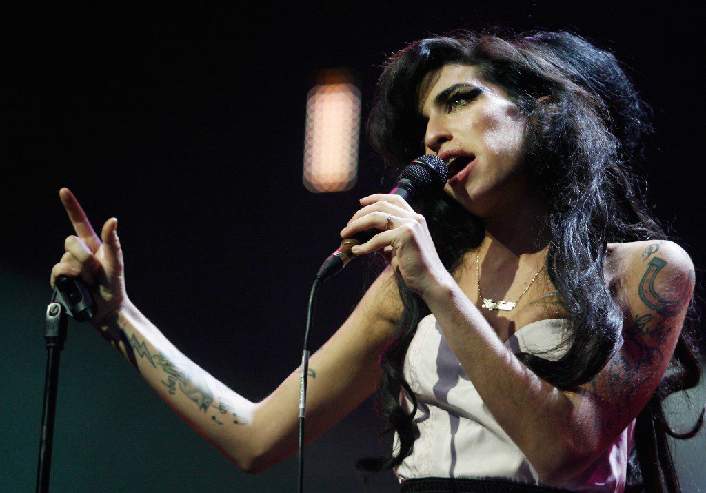 LONDON - SEPTEMBER 19: Singer Amy Winehouse performs at the Music of Black Origin Awards (MOBO) at the O2 Arena Greenwich on September 19, 2007 in London, England. (Photo by Jo Hale/Getty Images)